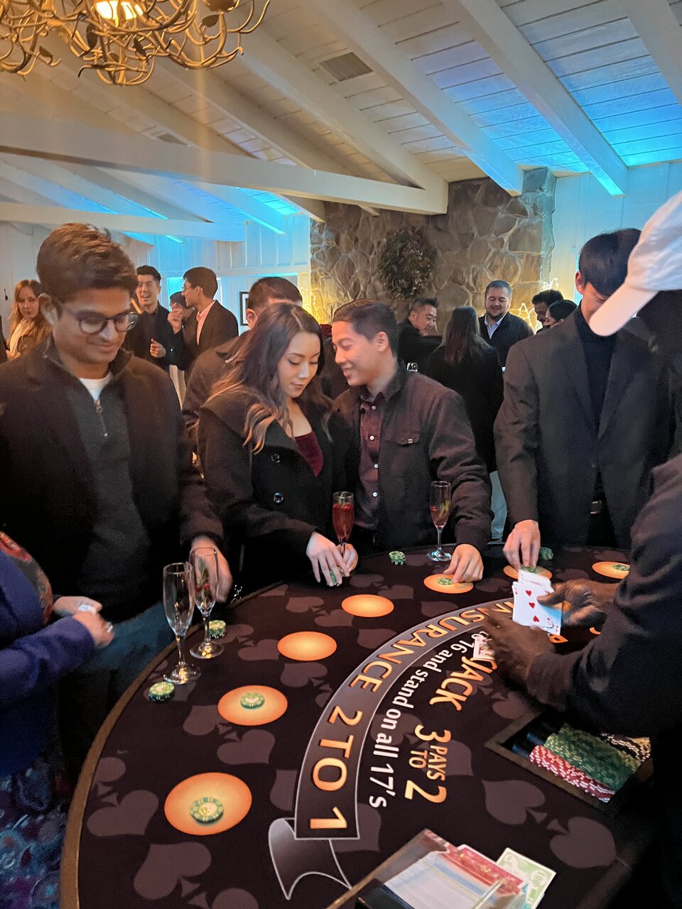 Guests playing blackjack with a pro dealer at a Salt Lake City casino night