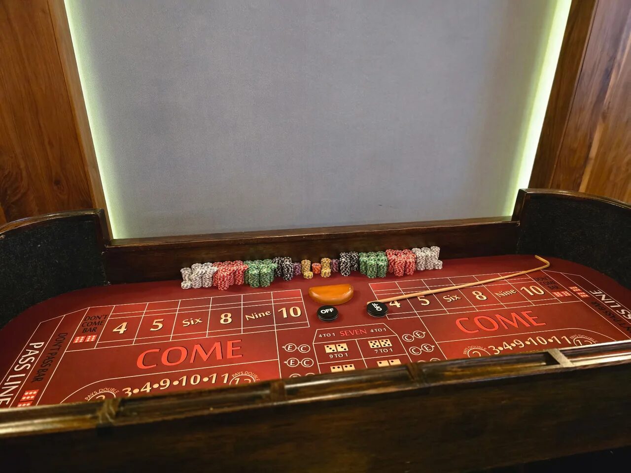 Close-up of a craps table layout with casino chips at a Salt Lake City casino party
