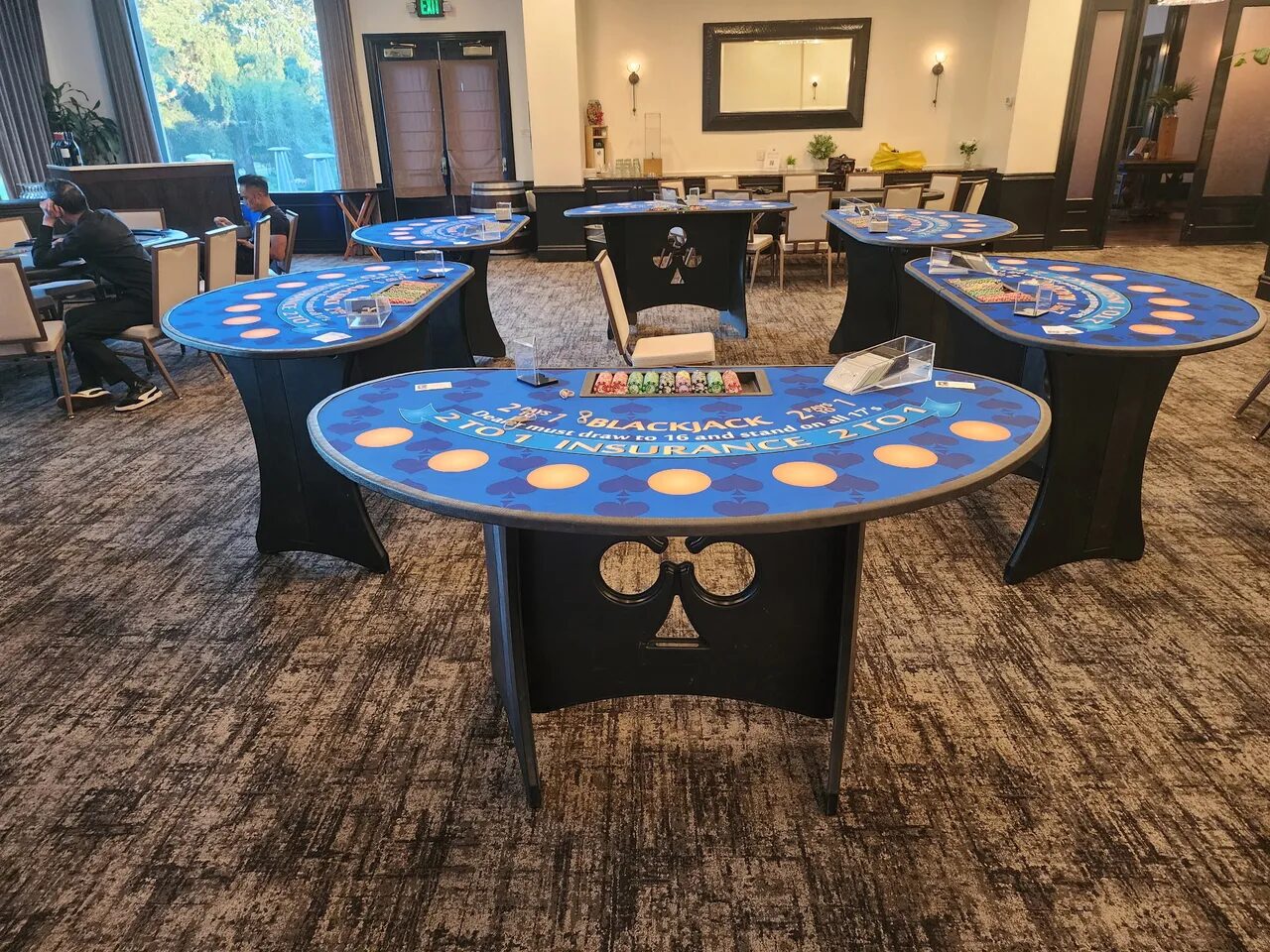 Rows of blackjack tables at a Salt Lake City fundraiser casino night