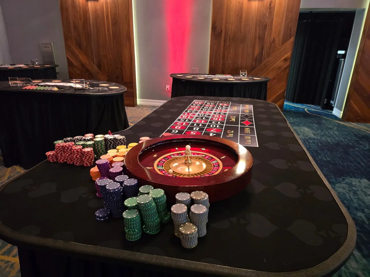 Roulette wheel glowing at a Salt Lake City holiday casino party